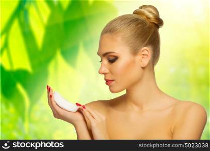Young girl with soap on floral background