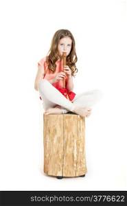 young girl with soprano recorder and white background