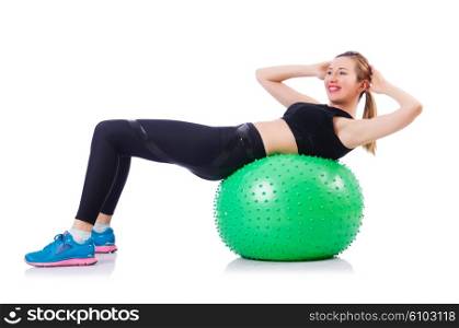 Young girl with swiss ball doing exercise