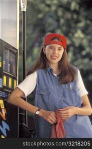 Young Girl Working at Gas Station