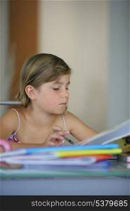 Young girl working on her homework