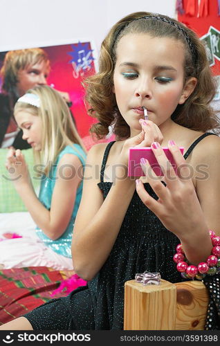 Young Girls Applying Makeup