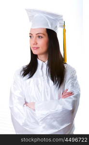 Young graduate isolated on the white background