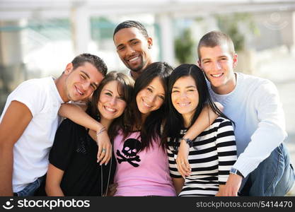 Young group of friends hanging out in the city