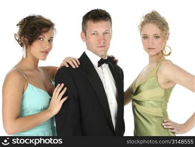 Young group, one man and two women, in formals over white.