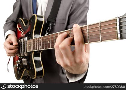 Young guitar player isolated on white