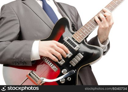 Young guitar player isolated on white