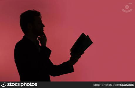 Young guy reading the comic book