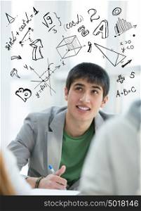 Young guy student at school with math symbols overhead. Education concept