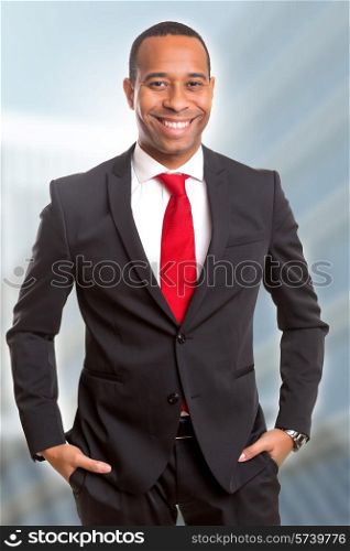 Young handsome african business man posing