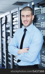 young handsome business man engineer in datacenter server room