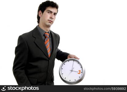 young handsome business man holding a clock