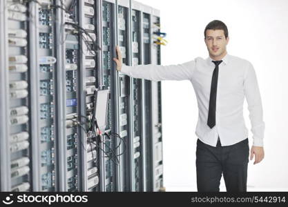 young handsome business man it engeneer in datacenter server room