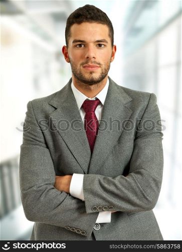 young handsome business man portrait at the office
