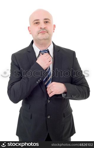 Young handsome businessman adjusts his tie, isolated