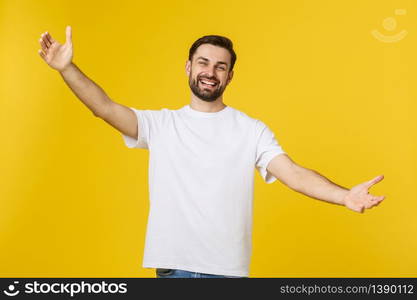 Young handsome cool man feels confident giving a hug to the camera. Young handsome cool man feels confident giving a hug to the camera.