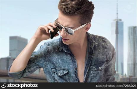 Young handsome guy wearing stylish sunglasses