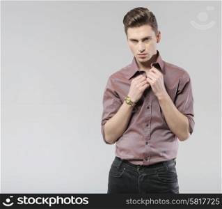 Young handsome guy with classic haircut