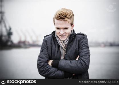 Young handsome man fashion model casual style on street industrial background