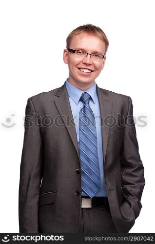 Young handsome man in grey suit and glasses smiling isolated on white background