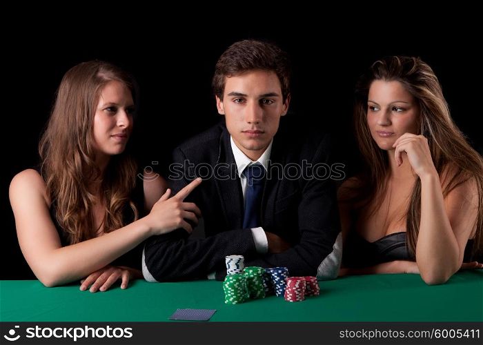 Young handsome man playing texas hold&rsquo;em poker