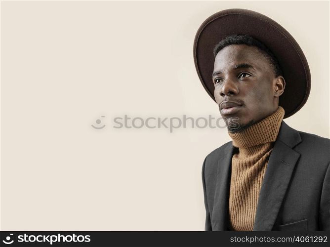 young handsome man posing with hat 6