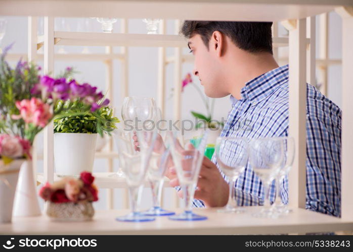 Young handsome man shopping in shop