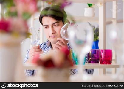 Young handsome man shopping in shop