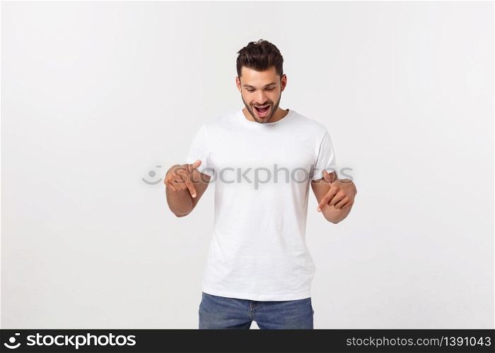 young handsome man shouting aggressively, looking very angry, frustrated, outraged or annoyed, screaming. Isolated over white background. young handsome man shouting aggressively, looking very angry, frustrated, outraged or annoyed, screaming. Isolated over white background.