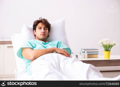 Young handsome man staying in hospital 