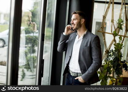 Young handsome man with mobile phone