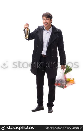 Young handsome man with vegatables in shopping concept . The young handsome man with vegatables in shopping concept 