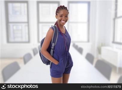 young happy african girl student at school. student
