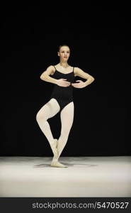 young happy ballet girl ballerina perform dance on stage at ballet school class