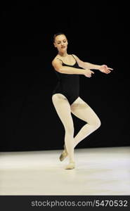 young happy ballet girl ballerina perform dance on stage at ballet school class