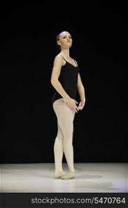 young happy ballet girl ballerina perform dance on stage at ballet school class