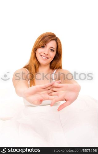 Young happy beautiful woman moments after waking up