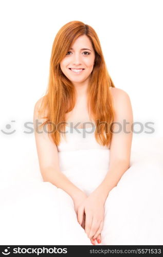 Young happy beautiful woman moments after waking up