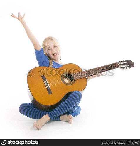 young happy blond girl in blue with guitar against white background