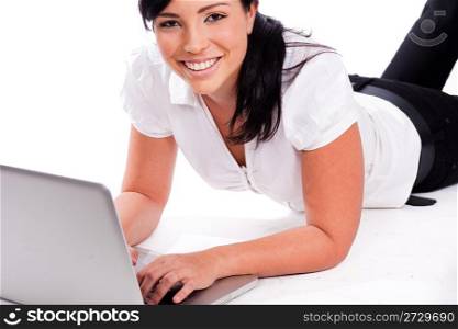 Young happy business woman working with the laptop on a white isolated backgroud