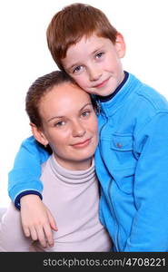 Young happy cheerful mother with little son on a white background