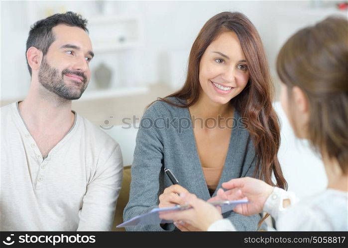 young happy couple after therapy session with psychologist