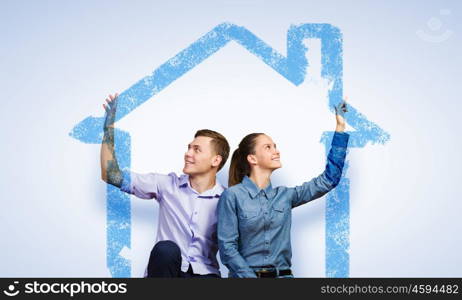 Young happy couple. Conceptual image of young couple hugging each other and dreaming