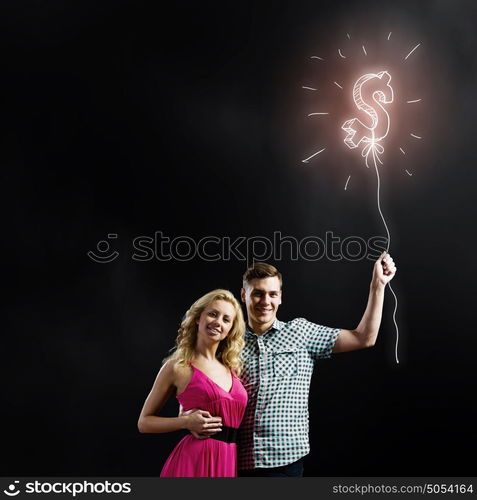 Young happy couple. Conceptual image of young couple hugging each other and dreaming