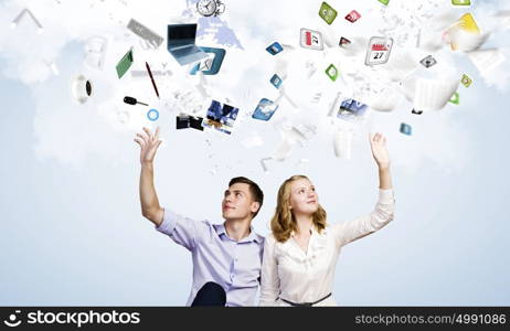 Young happy couple. Conceptual image of young couple sitting on floor