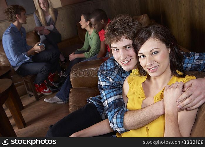 Young happy couple in cafe