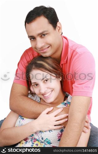 Young happy couple on white background