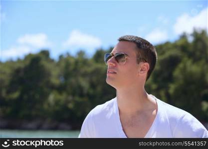 young happy man have fun on luxury boat yacht