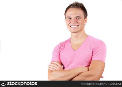 Young happy man smiling wih arms folded isolated on white background