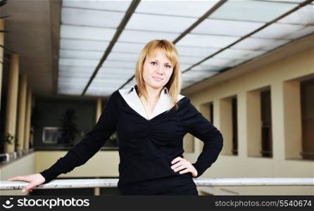 young happy student woman girl posing at university building
